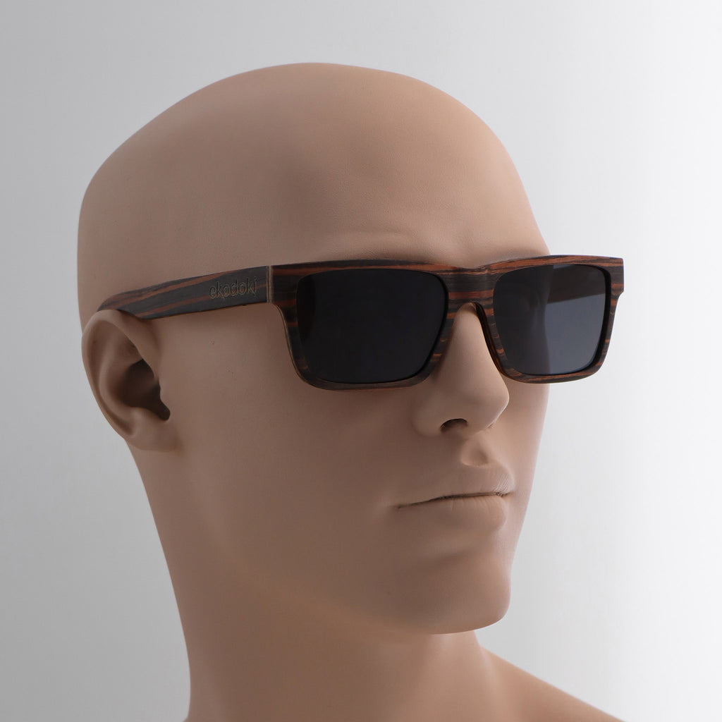 wooden sunglasses wayfarer style striped ebony wood smoke lenses on tan male mannequin head eKodoKi METRO